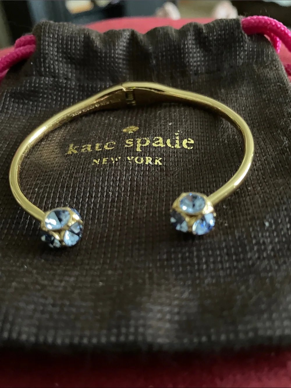 kate spade Gold Open Cuff with Light Blue Crystal Ends Bracelet & Dust Bag - Picture 2 of 4